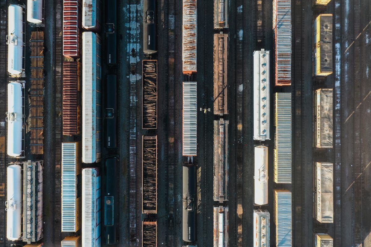 Container terminal with stacked shipping containers and freight forwarding operations